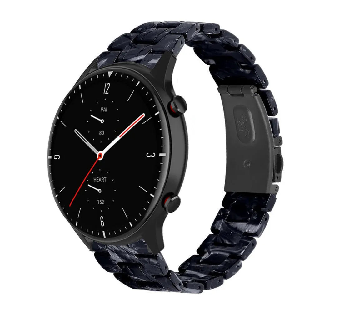 Metal Resin Strap, black/white, on a watch, 3/4 front view