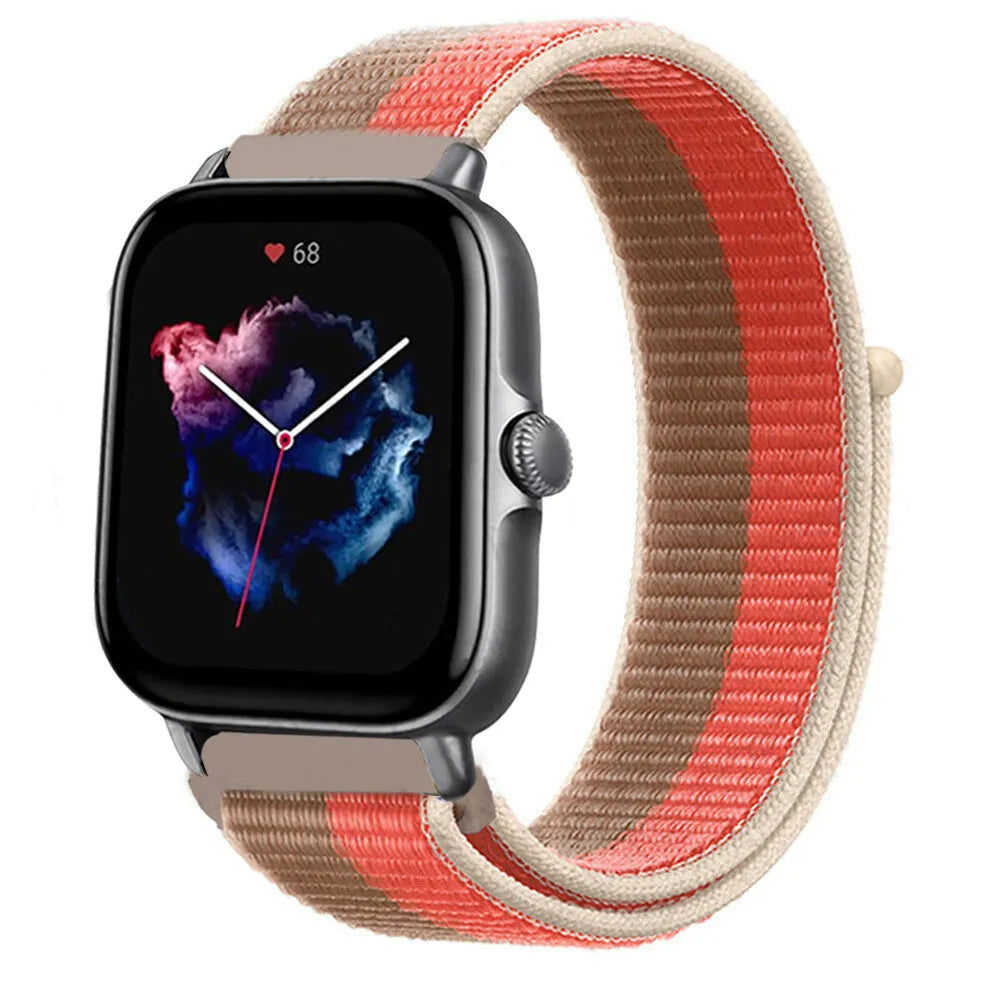 Nylon Strap, pink pomelo, on a watch, 3/4 front view