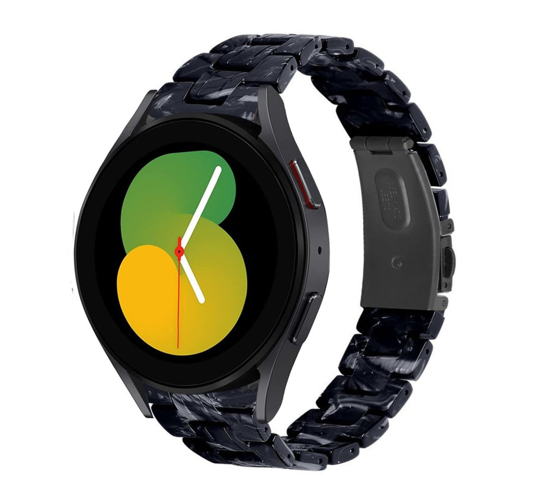 Metal Resin Strap, black/white, on a watch, 3/4 front view