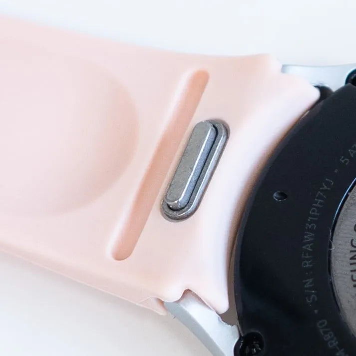 Silicone Strap 'One Push', pink, on a watch, 3/4 rear view