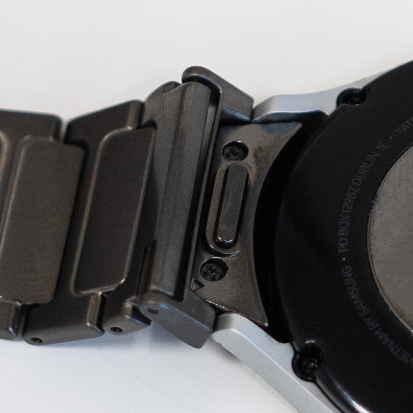 Titanium Strap 'One Push', graphite, on a watch, 3/4 rear view