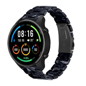 Metal Resin Strap, black/white, on a watch, 3/4 front view