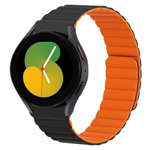 Magnetic Silicone Strap, black/orange, on a watch, 3/4 front view