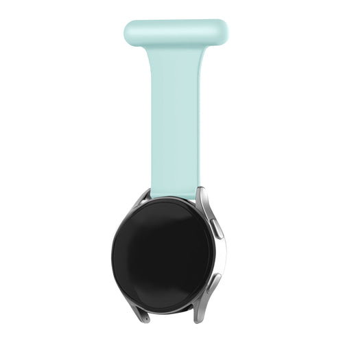 Silicone Nurse Fob, light green, on a watch, 3/4 rear view