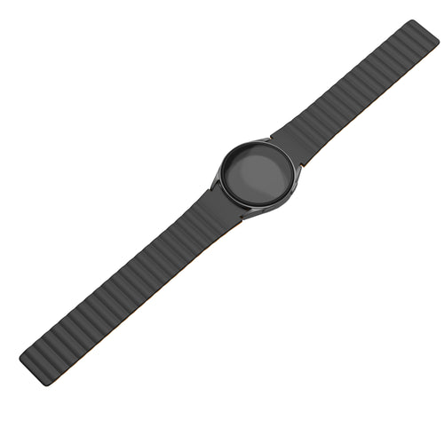 Magnetic Silicone Strap, black/orange, on a watch, direct front view